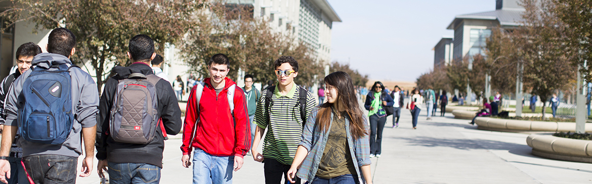 UC Merced students walking scholars lane 
